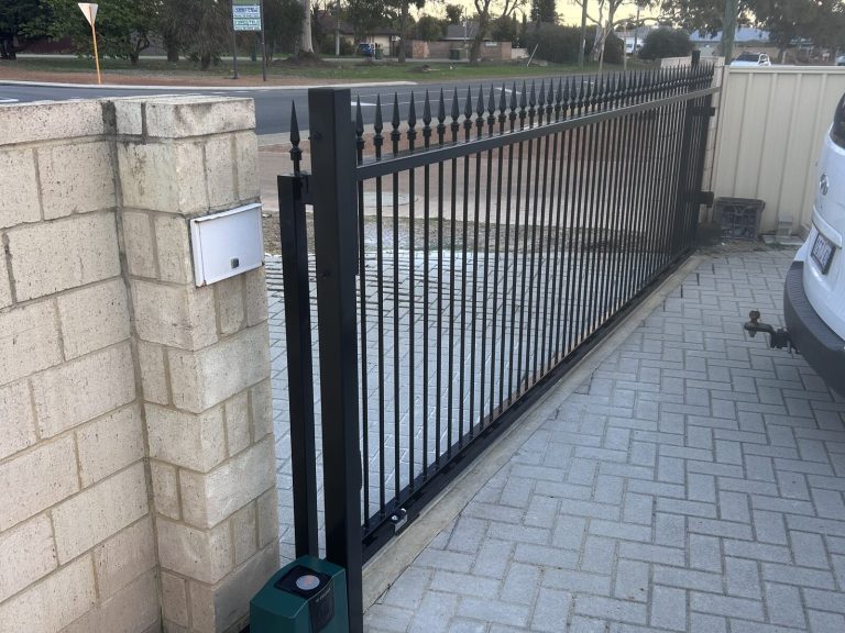 Finished tracked sliding gate in satin black, Forrestfield